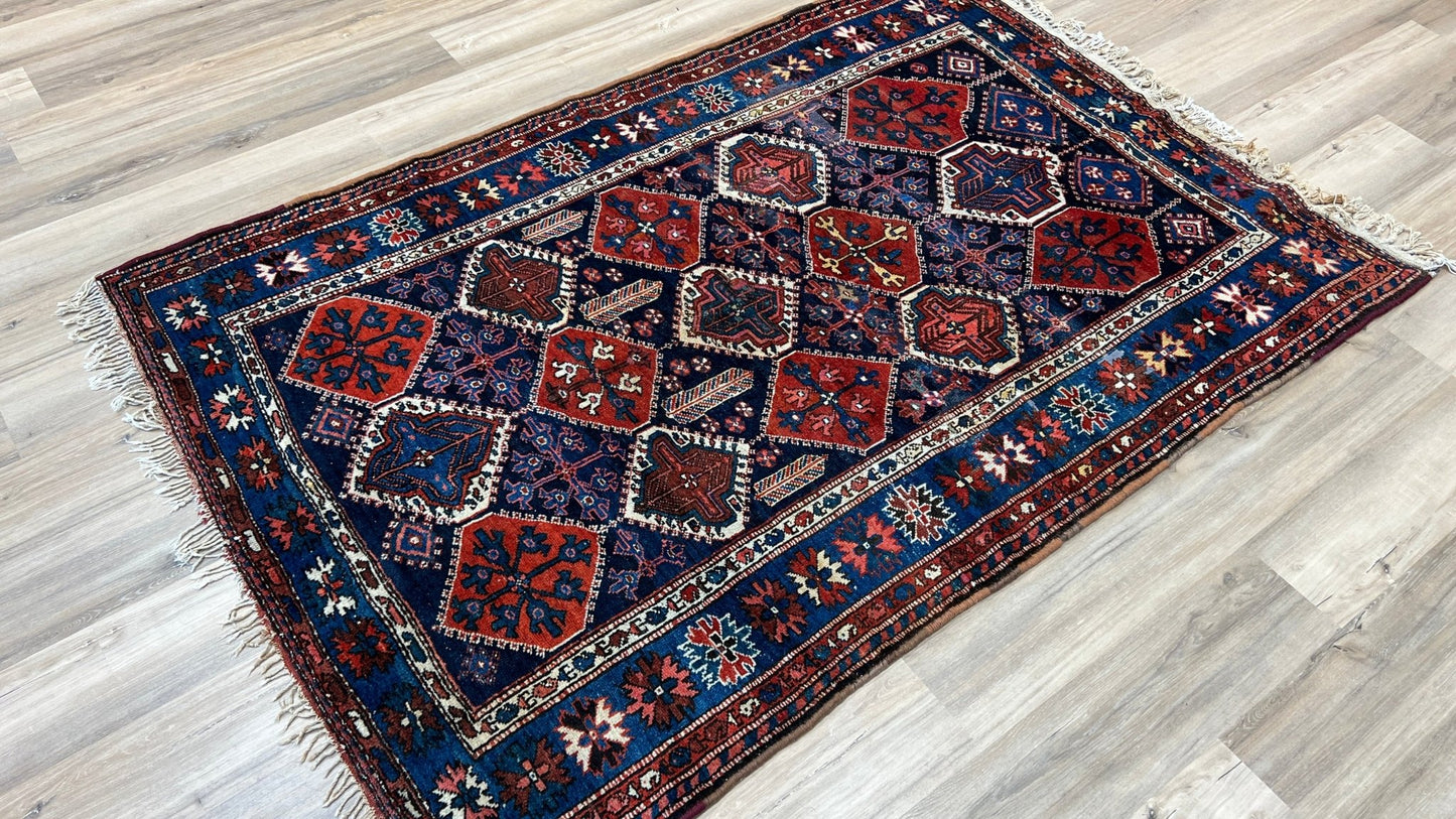 Kurdish Geometric 4'9"x7' Area Rug